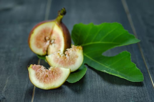 Portion of fresh Figs on wooden background