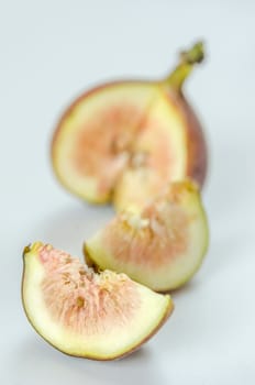 sliced fresh figs fruit on white background