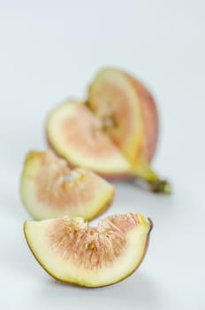 sliced fresh figs fruit on white background