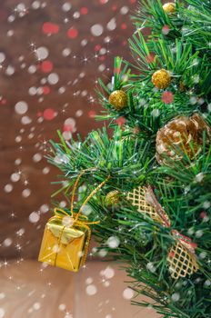 Christmas background with decorations and gift boxes on wooden board