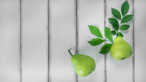 top view fresh pears on the wooden background, Free space for text