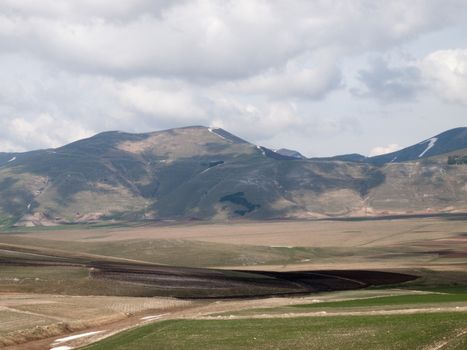 Italy, Castelluccio di Norcia big plan of Monti Sibillini.