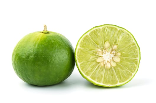 Fresh lime fruit and half of lime isolated on white background