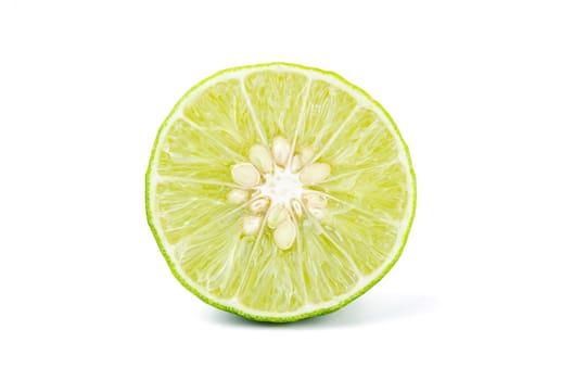 Fresh half of lime isolated on white background