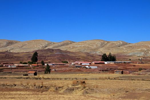 Houses in village, crater of volcano Maragua, Bolivia