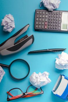 Desk with Tools and Notebook office desk on blue background