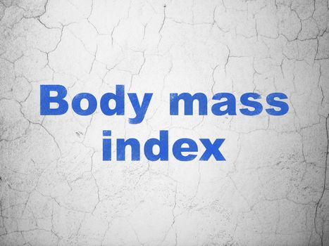 Medicine concept: Blue Body Mass Index on textured concrete wall background