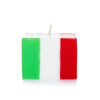 Decorative Handmade candle isolated on white background. Cube-shaped souvenir candle as Italian state flag and country symbol. Rectangular cube block shaped candles.