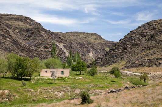 Nuratau, or Nurota, black mountains in Uzbekistan, in spring