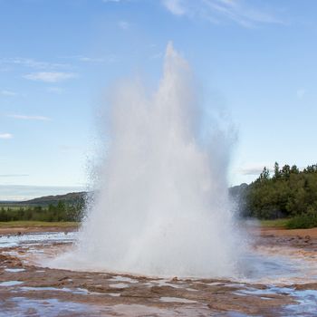 Geyser Strokkur eruption in the Geysir area, Iceland