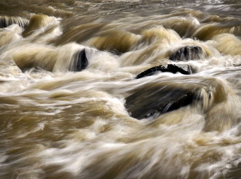 abstract background Wild turbid water in the river after rain