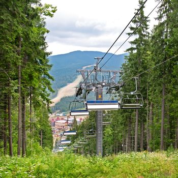 the chair lift in the mountains in summer