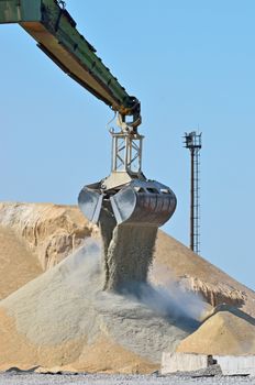 Excavator working on industrial construction site