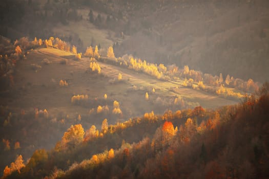 Fall in mountain hills. Alpine October scene