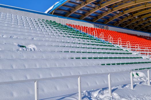 Background chairs at stadium , winter