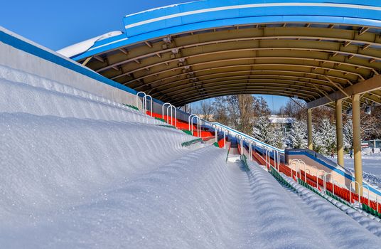 Background chairs at stadium , winter