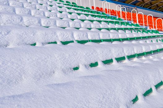 Background chairs at stadium , winter