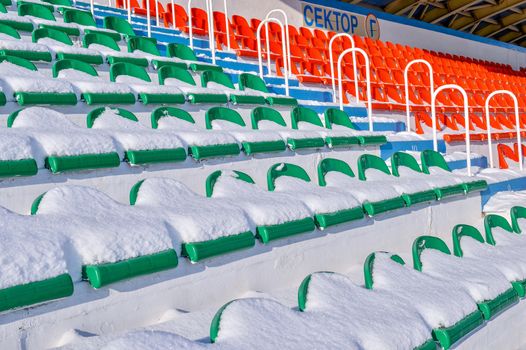 Background chairs at stadium , winter