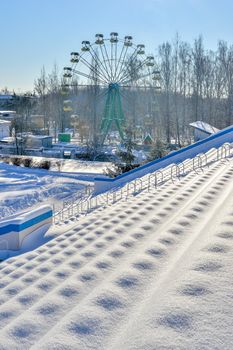 Background chairs at stadium , winter