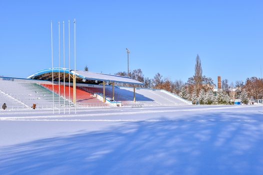 Background chairs at stadium , winter
