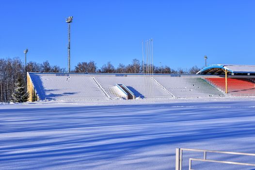 Background chairs at stadium , winter