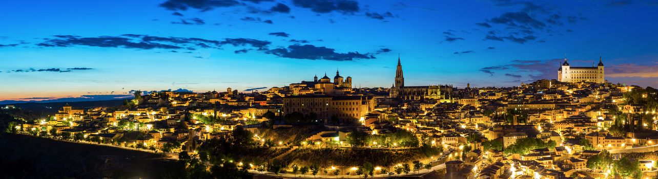 Panorama shot of Toledo Cityscape with Alcazar at dusk in Madrid Spain