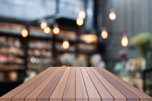 Perspective luxury wooden with blurred cafe background. product display template