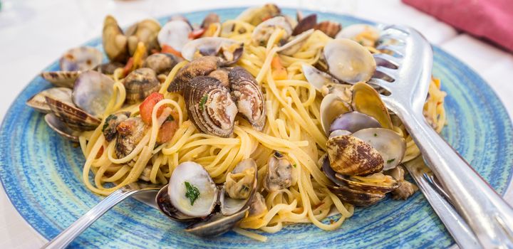 Restaurant in Naples, Italy. No photography set for this just arrived on the table Spaghetti alle vongole