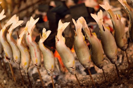 Japanese street food Grilled Ayu fish in horizontal frame