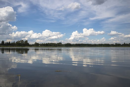 blue lake with cloudy sky, nature series