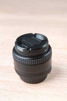 close up of a camera photo lens on white
