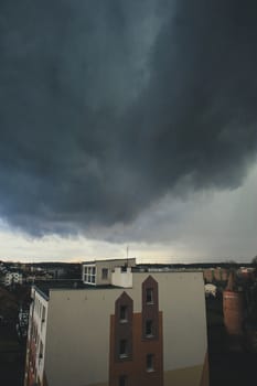 Dramatic dark storm clouds over the city