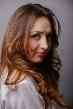 young beautiful brunette woman portrait in studio