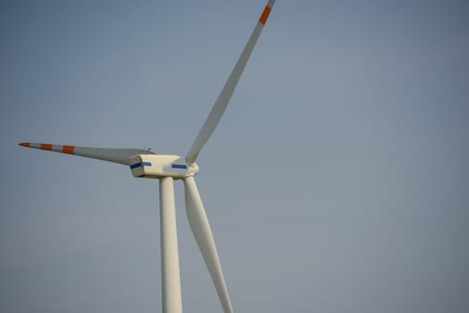 wind trubine at sunny day with blue sky