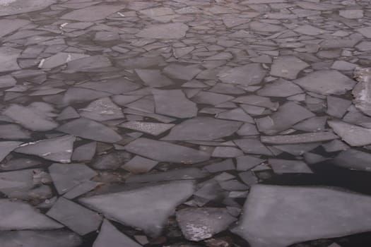 broken ice on the water space, winter