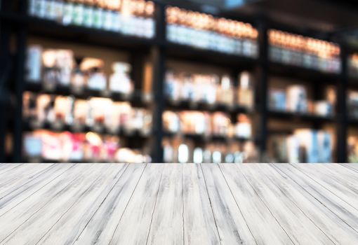 Luxury white top wooden with blurred coffee shop background. product display template