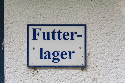 Information sign or blackboard with inscription in German feed stores.