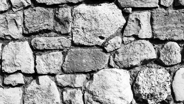 The wall made of stone black and white background