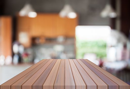 Abstract blur coffee shop with empty wooden top. For product display