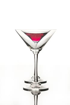 Wineglasses on glass reflecting background