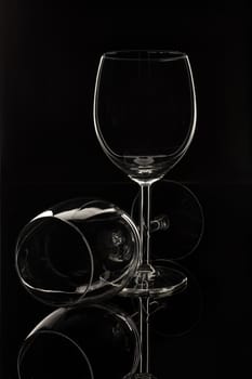 Wineglasses on glass reflecting background
