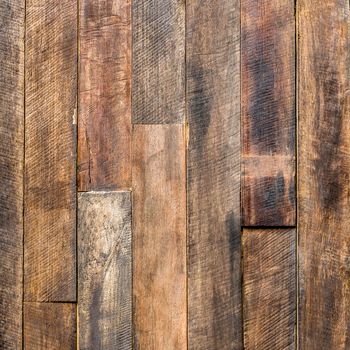 close up of wall made of wooden planks wood texture background old panels.