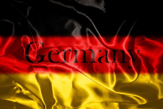 German flag blowing in the wind With Germany Written On It