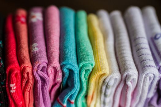 A pile of colorful clothes on white