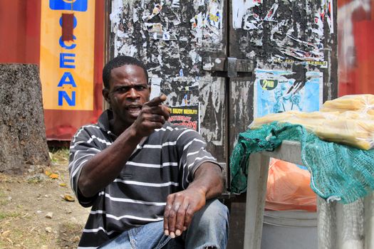 Barbados, Barbados - April 8, 2013: Angry man on the island of Barbados points finger. 