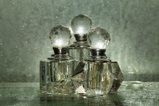 Bottles for perfumery with patches of light
