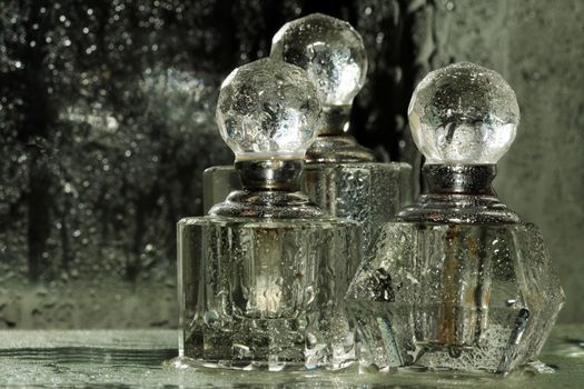 Bottles for perfumery with patches of light