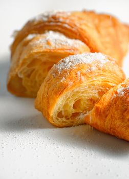 Sliced fresh and tasty croissant