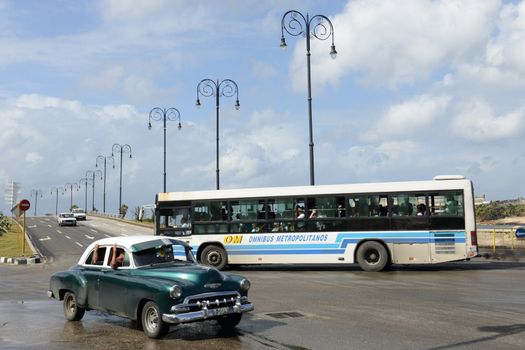 Havana, Cuba - 27 January 2016: Person driving his vintage car at the Malecon in Havana on Cuba