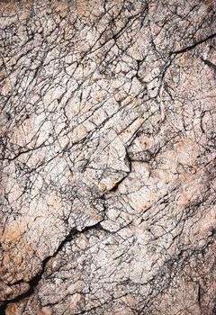 abstract background or texture defaced cracks limestone rock